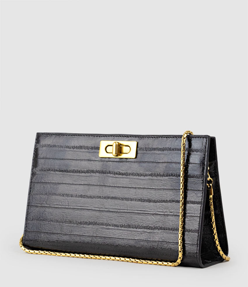NAYLA Bag with Twist Hardware in Black Eel Print - Edward Meller
