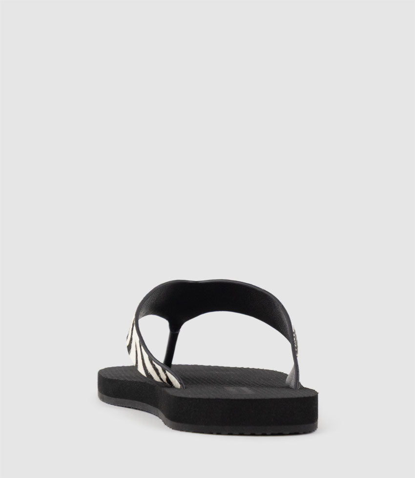 TALITA Leather Thong on Rubber Sole in Zebra Hair - Edward Meller