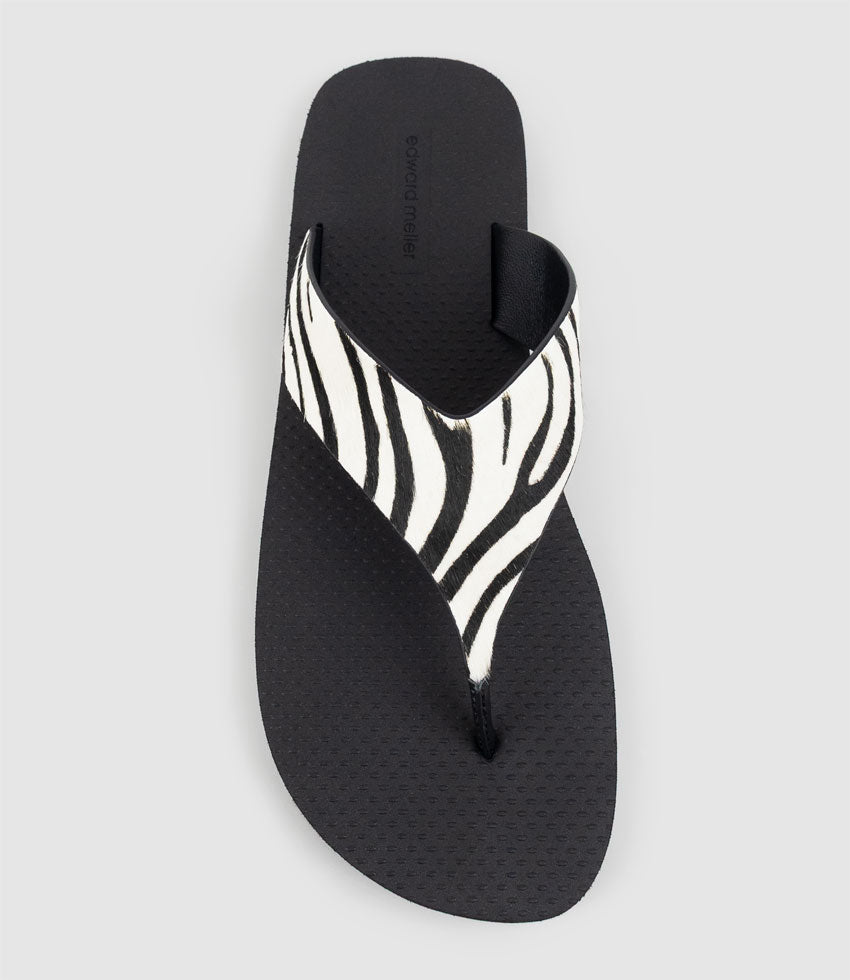TALITA Leather Thong on Rubber Sole in Zebra Hair - Edward Meller
