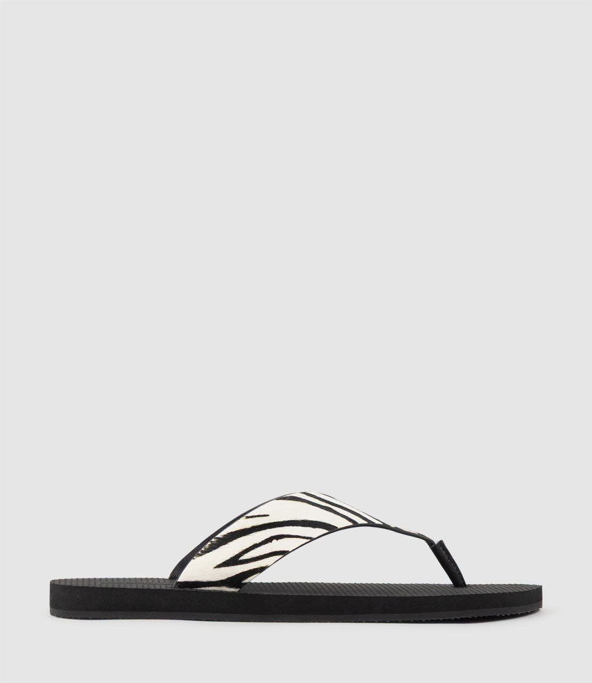 TALITA Leather Thong on Rubber Sole in Zebra Hair - Edward Meller
