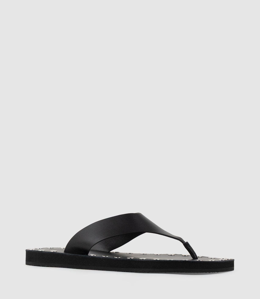 THEA Leather Thong on Studded Sole in Black - Edward Meller