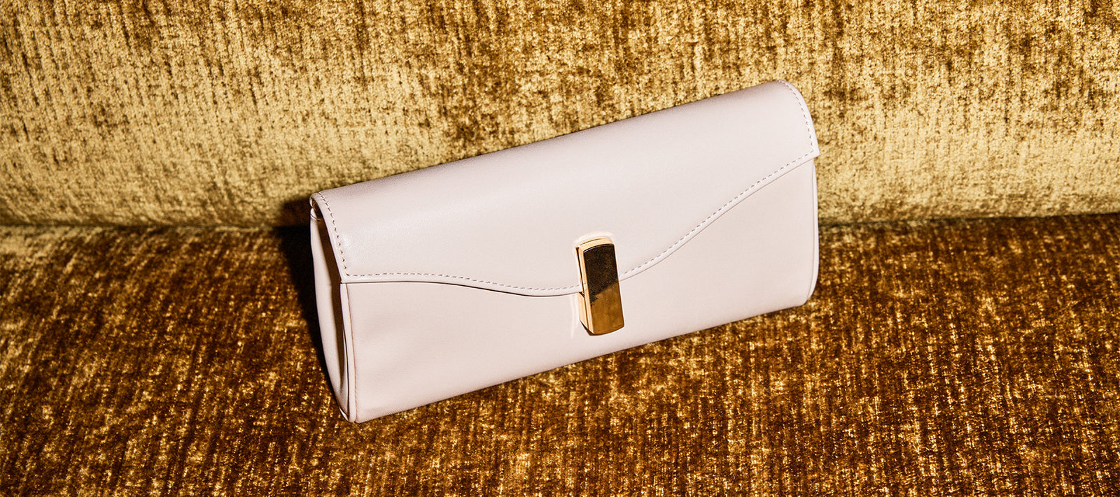 NAIA Fold over Clutch in Shell