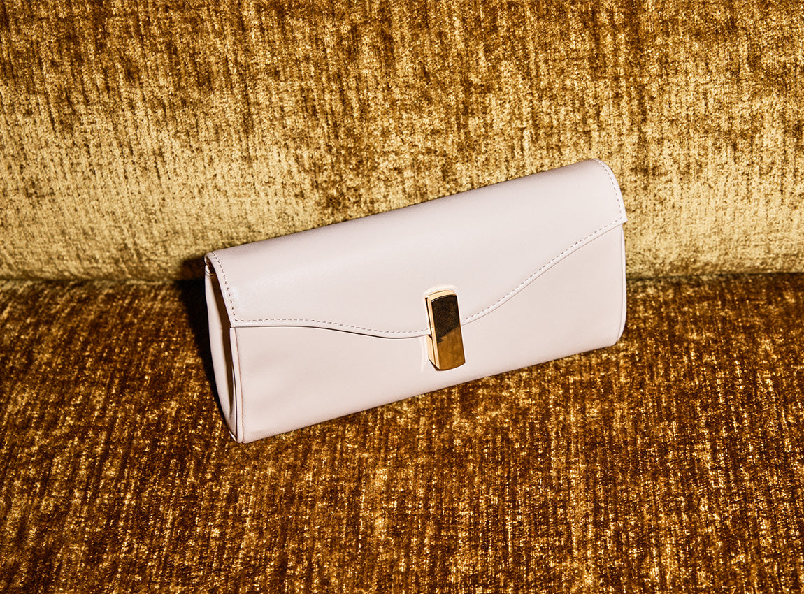 NAIA Fold over Clutch in Shell