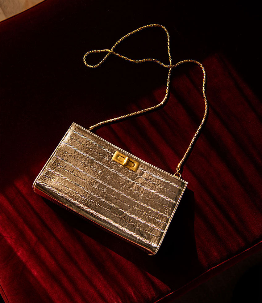 NAYLA Bag with Twist Hardware in Gold Eel Print - Edward Meller