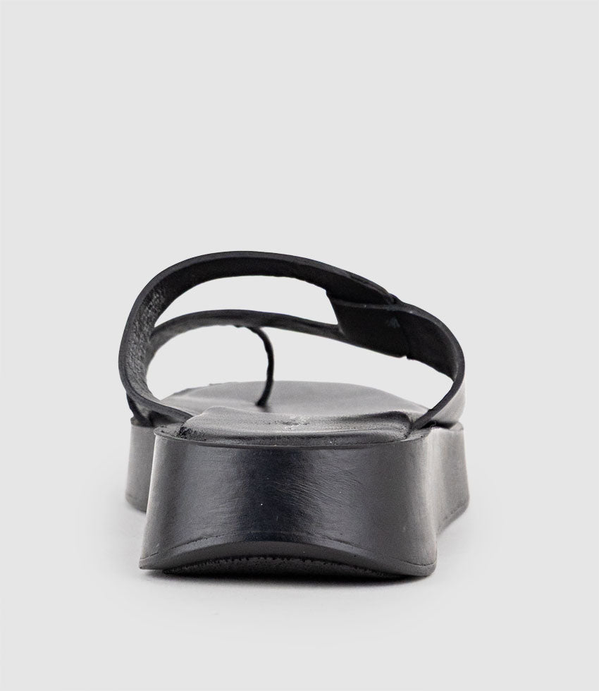 KRISS Asymmetrical Slide on Unit in Black - Edward Meller