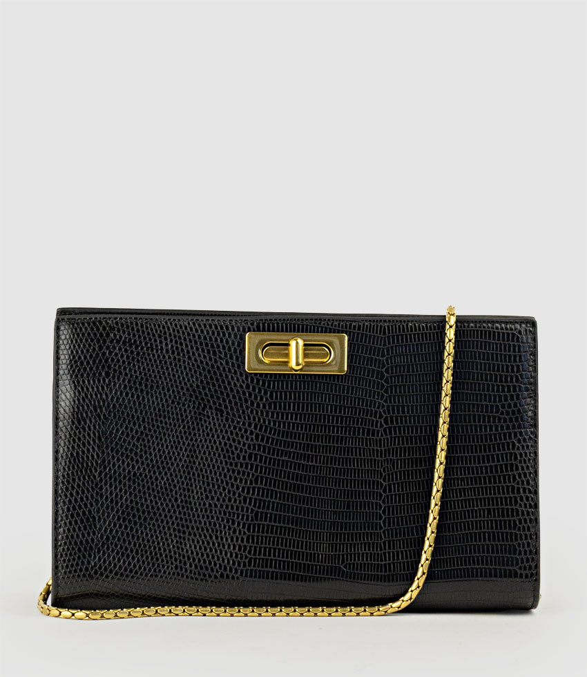 NAYLA Bag with Twist Hardware in Black Tejus Lizard Print - Edward Meller