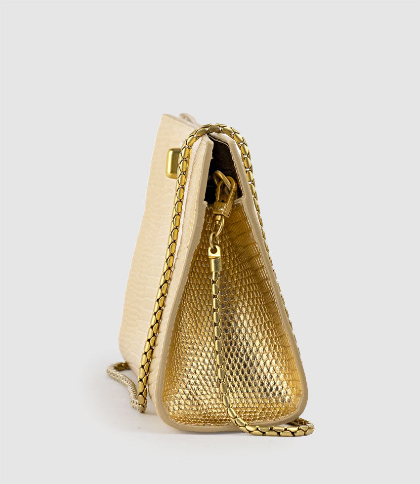 NAYLA Bag with Twist Hardware in Gold Tejus Lizard Print - Edward Meller