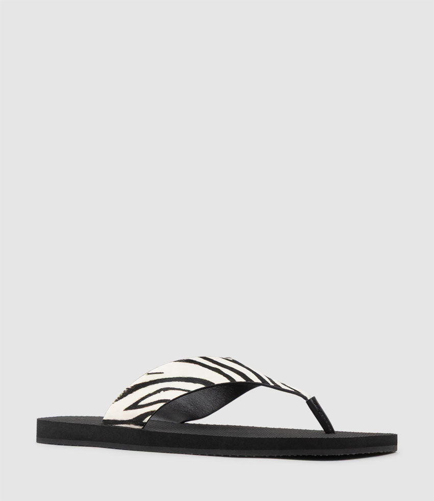 TALITA Leather Thong on Rubber Sole in Zebra Hair - Edward Meller