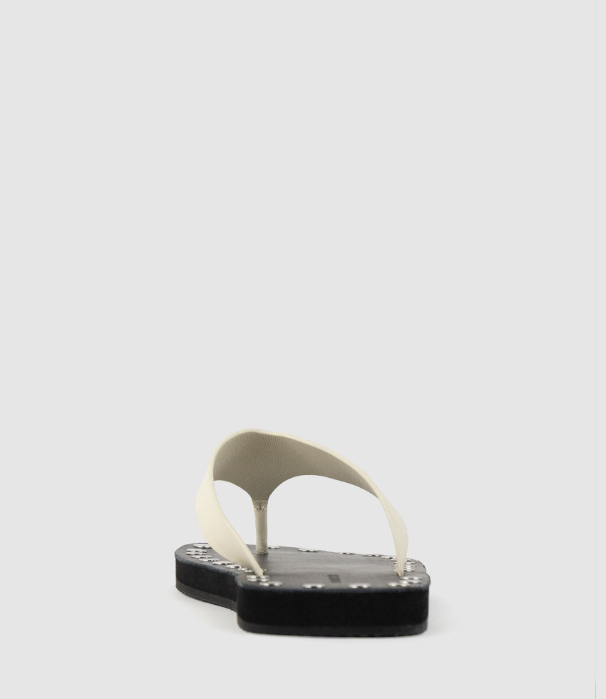 THEA Leather Thong on Studded Sole in Offwhite - Edward Meller