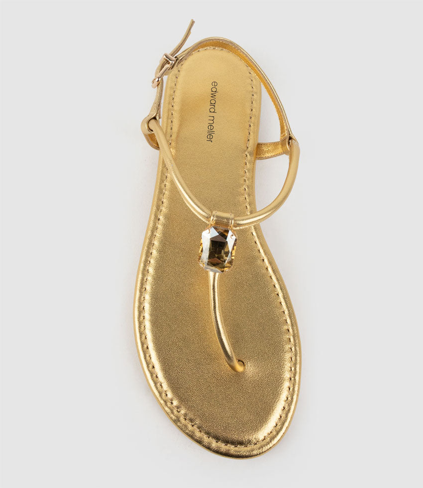TOPAZ Fine Strap Thong with Crystal in Aged Gold - Edward Meller