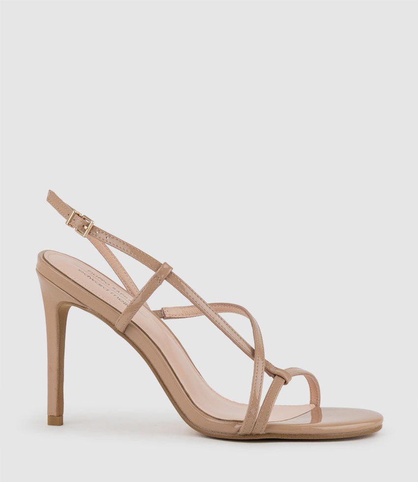 WRAITH100 Asymmetrical Strappy Sandal in Nude Patent